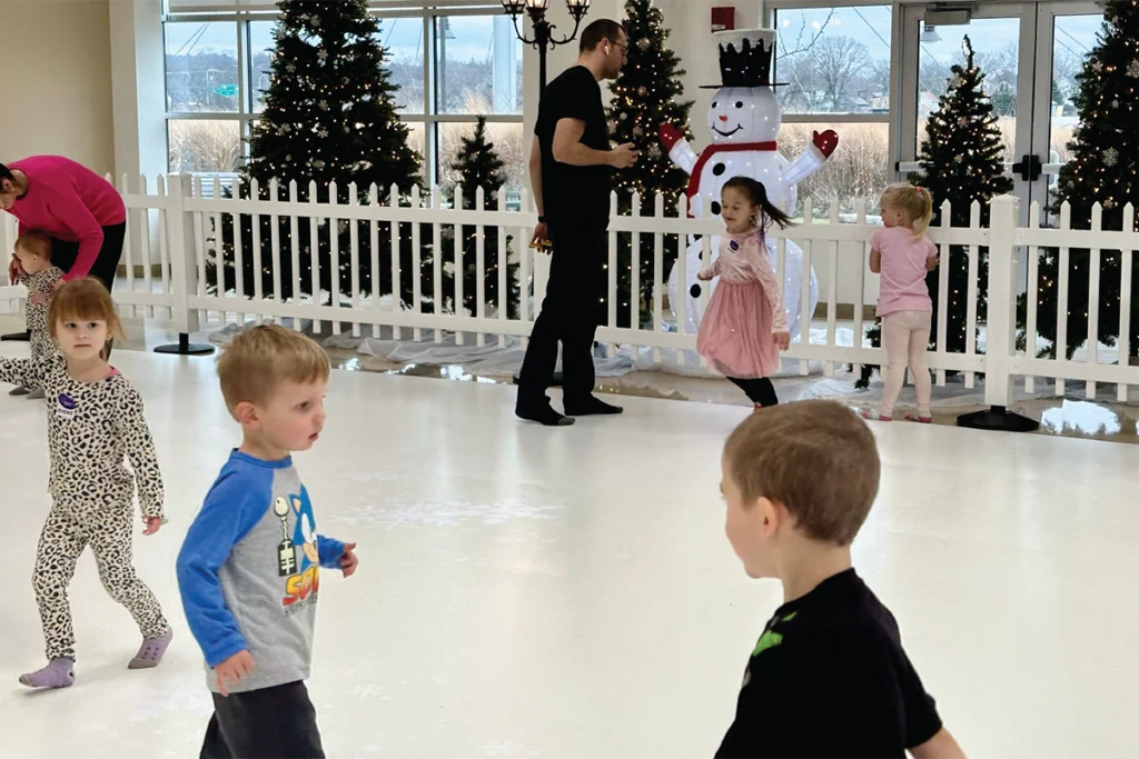 Children running around on indoor polar playground